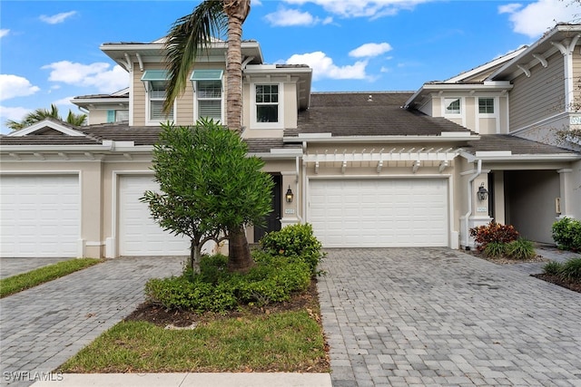 view of front of property featuring a garage