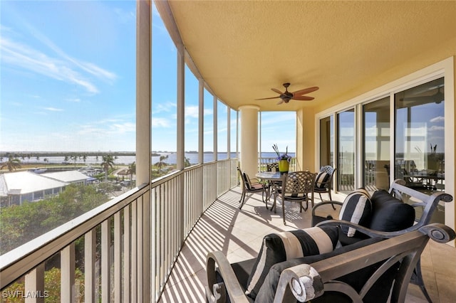 6081 Silver King Blvd Unit 206, Cape Coral, FL 33914 - balcony with a water view and ceiling fan