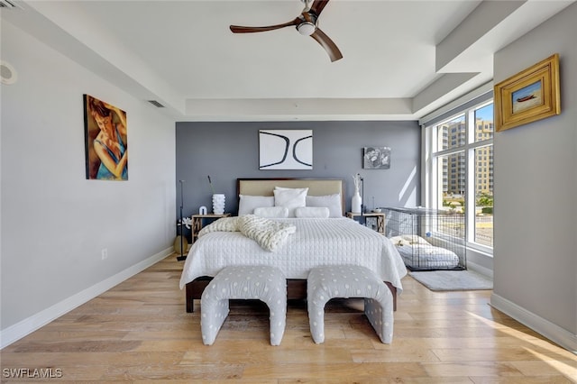 6081 Silver King Blvd Unit 206, Cape Coral, FL 33914 - bedroom featuring baseboards, ceiling fan, light wood-style flooring, and visible vents