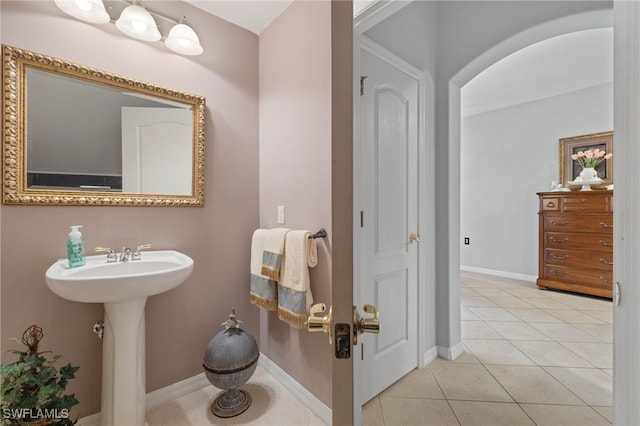 bathroom featuring sink and tile patterned flooring