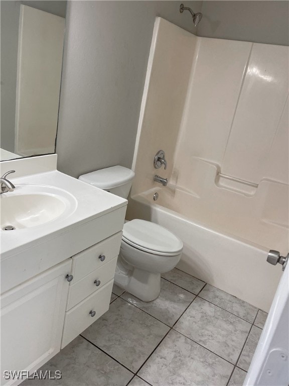 full bathroom with vanity, shower / washtub combination, toilet, and tile patterned flooring