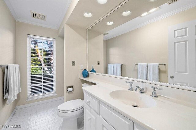 3323 Gin Ln, Naples, FL 34102 - bathroom featuring ornamental molding, baseboards, vanity, toilet, and recessed lighting