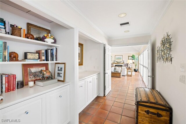 3323 Gin Ln, Naples, FL 34102 - corridor with ornamental molding, light tile patterned floors, and recessed lighting