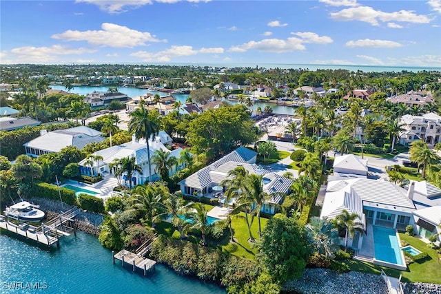 drone / aerial view with a water view