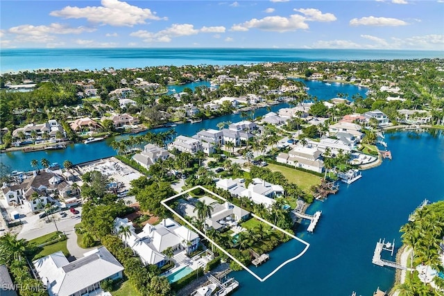 3323 Gin Ln, Naples, FL 34102 - aerial perspective of suburban area featuring a nearby body of water
