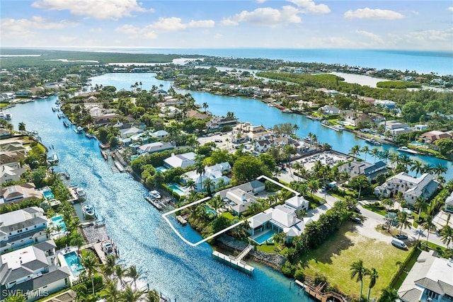 3323 Gin Ln, Naples, FL 34102 - aerial view of property and surrounding area featuring a large body of water and nearby suburban area