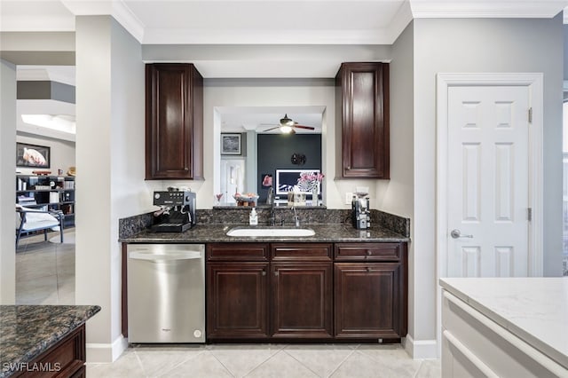 kitchen with dark stone counters, stainless steel dishwasher, sink, and crown molding