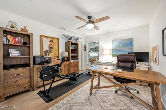 office area featuring light hardwood / wood-style flooring and ceiling fan