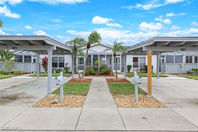 exterior space featuring a carport