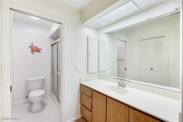 bathroom with walk in shower, vanity, and toilet