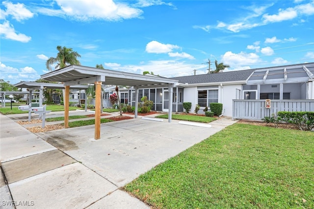 view of property's community featuring a yard