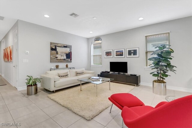 living room with light tile patterned floors