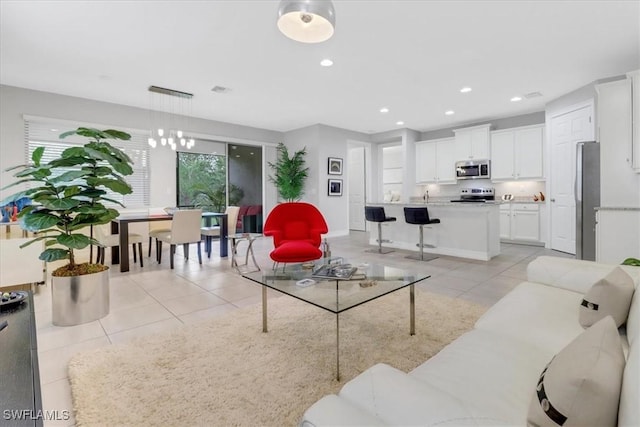 living room featuring light tile patterned flooring