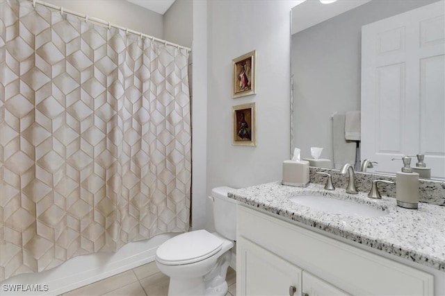 full bathroom featuring shower / bath combination with curtain, tile patterned floors, vanity, and toilet