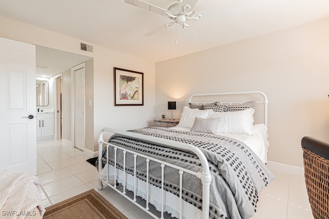 bedroom with ceiling fan and light tile patterned floors