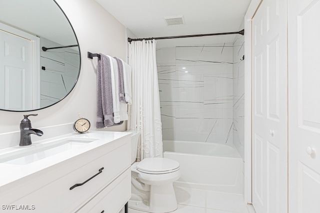 full bathroom featuring toilet, vanity, tile patterned flooring, and shower / bath combo with shower curtain