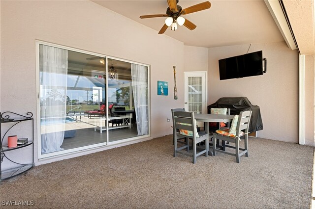 view of patio featuring ceiling fan