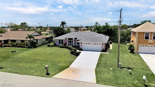 ranch-style house featuring a front yard and a garage