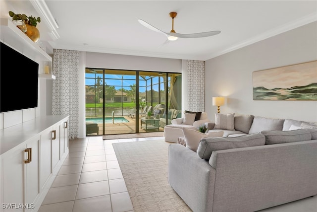 tiled living room with ceiling fan and ornamental molding