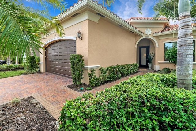 view of front of home with a garage