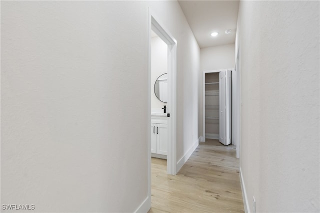 hallway featuring light wood-type flooring