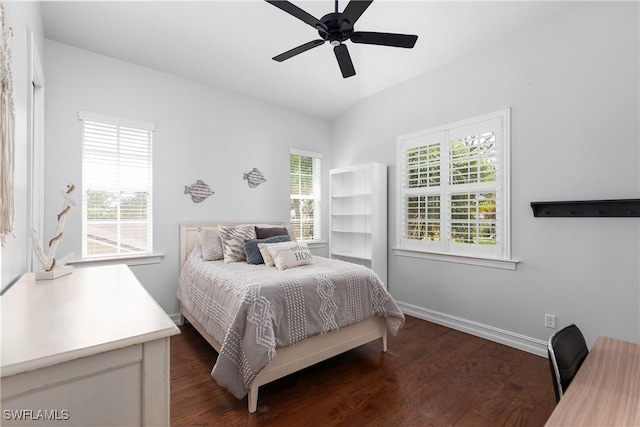 27232 J C Ln, Bonita Springs, FL 34135 - bedroom with multiple windows, dark wood finished floors, and baseboards