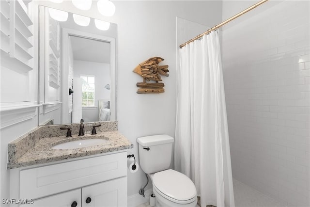 27232 J C Ln, Bonita Springs, FL 34135 - full bath featuring vanity, tiled shower, and toilet
