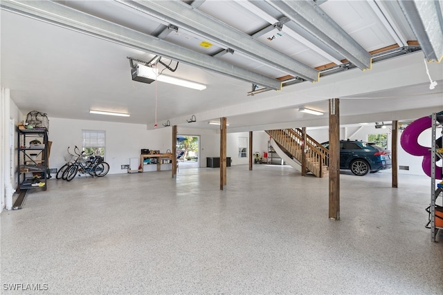 garage featuring a garage door opener