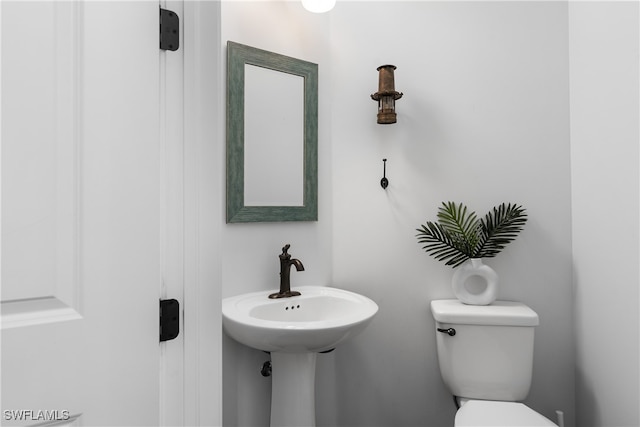 bathroom featuring toilet