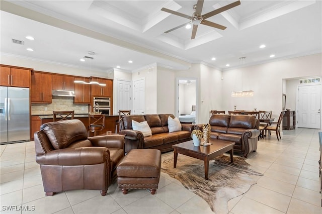 tiled living room with ceiling fan, coffered ceiling, crown molding, and beam ceiling