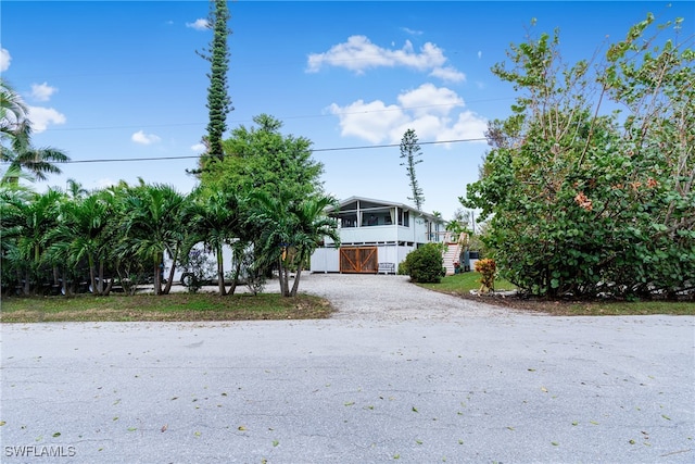 view of front of property with a sunroom