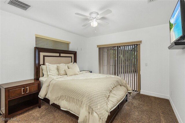 carpeted bedroom featuring ceiling fan and multiple windows