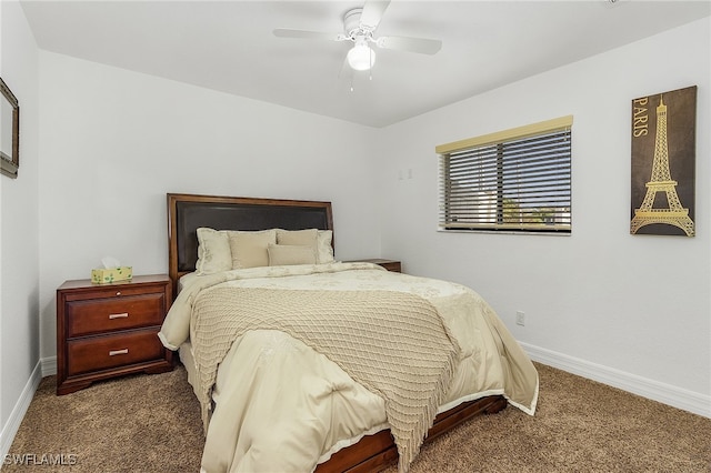 bedroom featuring dark carpet and ceiling fan