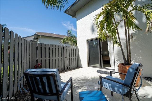 view of patio with fence