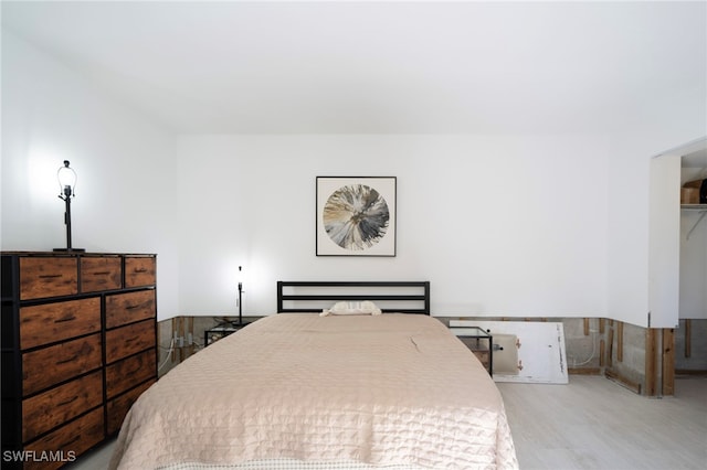 bedroom featuring light wood finished floors