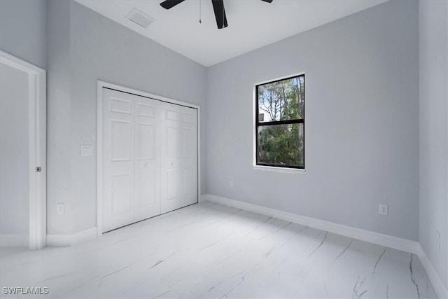 unfurnished bedroom with a closet and ceiling fan