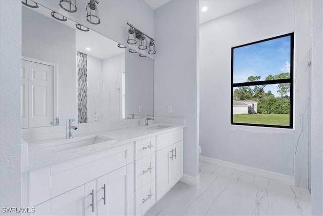 bathroom featuring vanity, toilet, and a tile shower