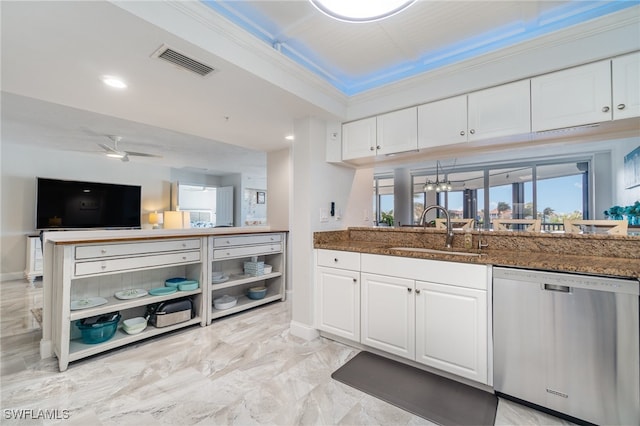 kitchen with ornamental molding, sink, white cabinets, dishwasher, and kitchen peninsula