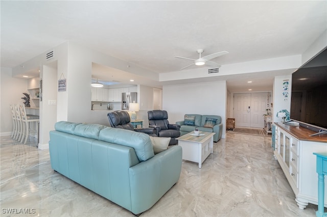 living room with ceiling fan