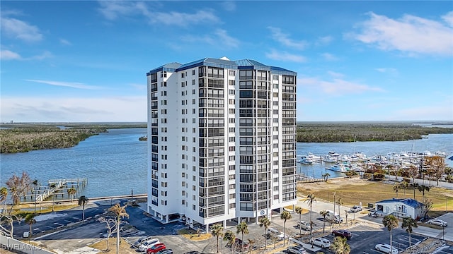 view of building exterior with a water view