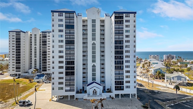 view of building exterior featuring a water view