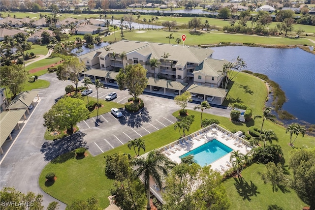 bird's eye view with a water view