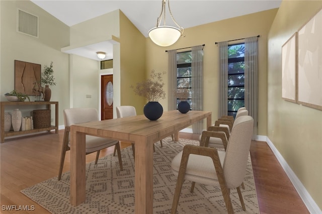 dining room featuring dark wood-type flooring