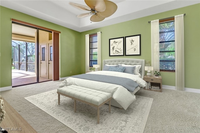 4632 Shearwater Ln, Naples, FL 34119 - bedroom with access to outside, carpet flooring, baseboards, and ceiling fan