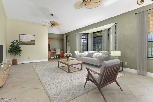 4632 Shearwater Ln, Naples, FL 34119 - living room featuring ceiling fan, vaulted ceiling, light tile patterned flooring, and baseboards