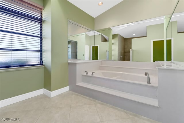 bathroom featuring lofted ceiling, tile patterned floors, and plus walk in shower