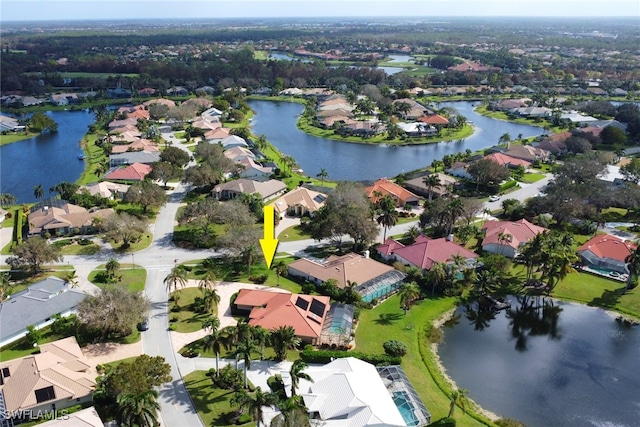 drone / aerial view featuring a water view