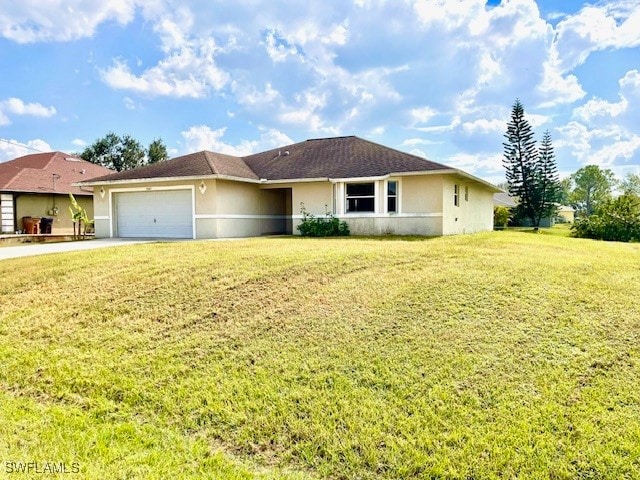 single story home with a front lawn and a garage