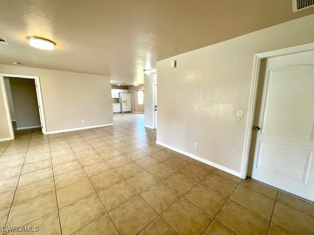 view of tiled empty room