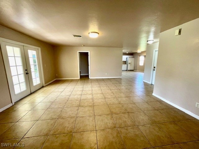 spare room with french doors